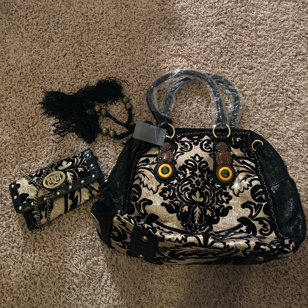 Original By Sharif Bag with clutch included!